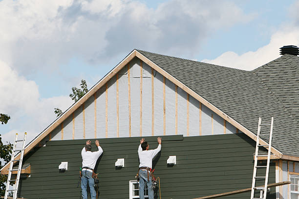 Professional Siding Installation technician working in White Hall, WV